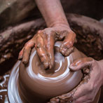 Doug Fitch and Hannah McAndrew making a jug for me